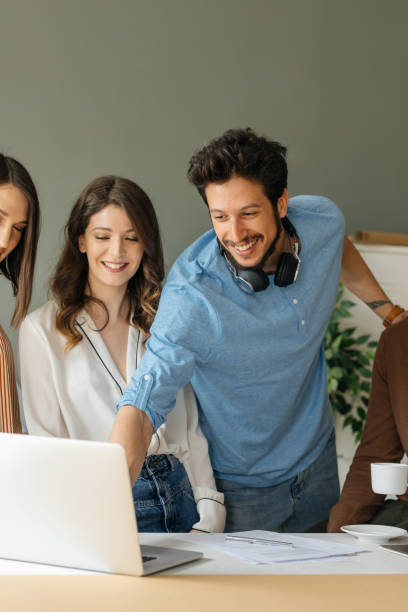 istock Group of Young Businesspeole Working Together 1181586077
