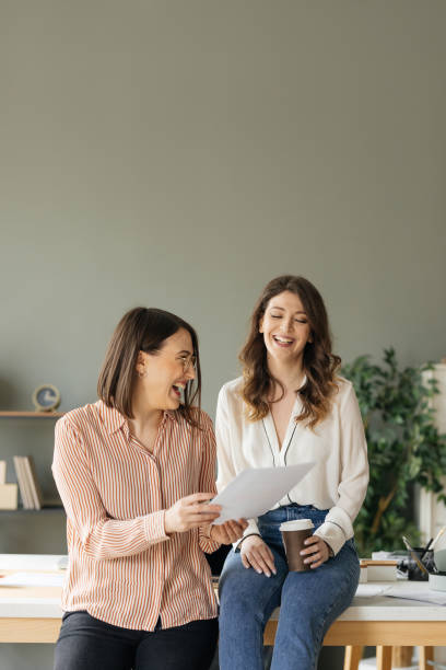 istock Two Businesswomen Working Together 1181586384