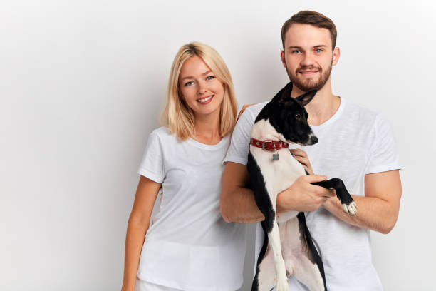 istock young trainers teaching dogs to perform some actions 1181588305