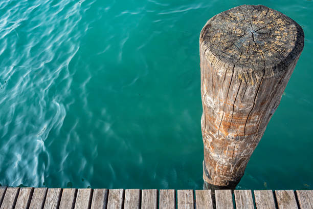 Wood mooring pole on Lake Garda