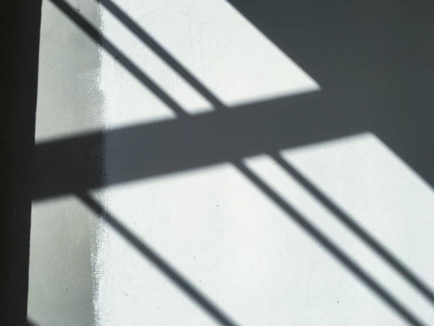 istock Light and Shadow lines on raw concrete or bare cement wall texture, Abstract white and grey colour background, Process building house concept 1181590086