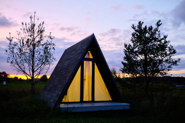 istock wigwams against the sunset sky. A hause 1181590114