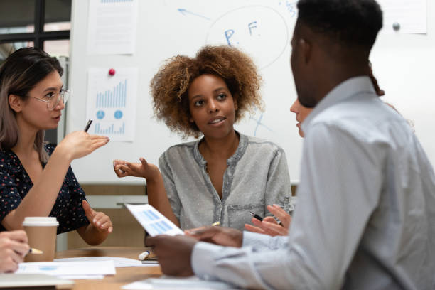 istock African ceo and staff do financial statement analysis at meeting 1181590557
