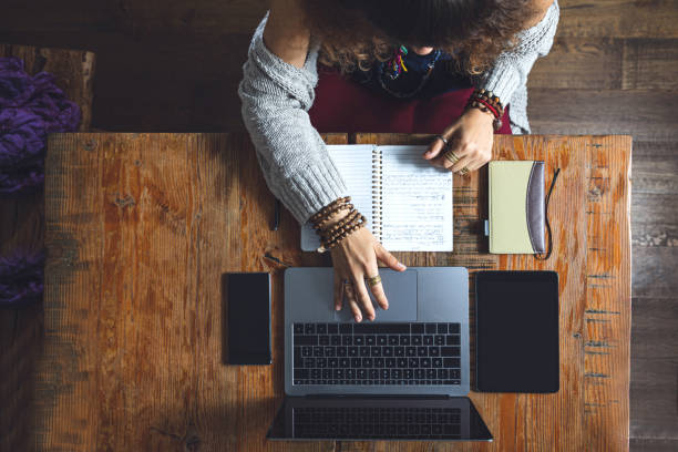 istock Woman at home studying and checking financial bills 1181592088