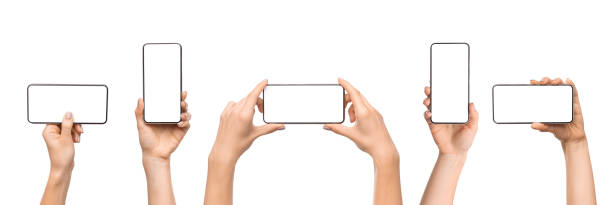 Set of female hands holding smartphone with blank screen Set of female hands holding smartphone with blank screen in different orientation isolated on white background, panorama clipping path photos stock pictures, royalty-free photos & images