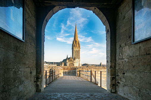 Church of San Pedro in Caen, framed by the main entrance of the Castle of Caen