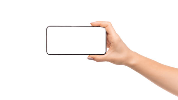 istock Woman's hand holding modern smartphone with blank screen for mockup 1181594773