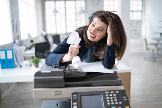 istock Mid age woman  in office 1181603182