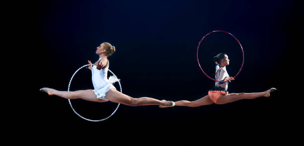 istock Gymnasts performing with hoop 1181603519