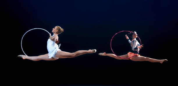 Gymnasts performing with hoop
