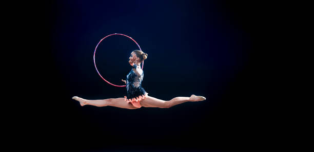 istock Gymnasts performing with hoop 1181603532