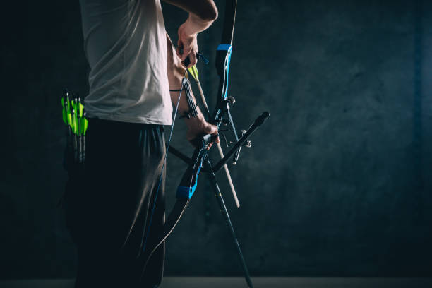 istock Man holding a bow and arrow 1181604889
