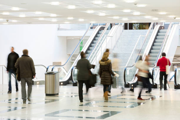 istock Large Group of People Walking Indoors, Social Issues 1181605813