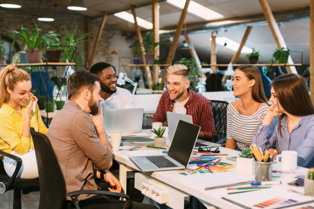 istock Creative start-up team discussing ideas in modern office 1181607218