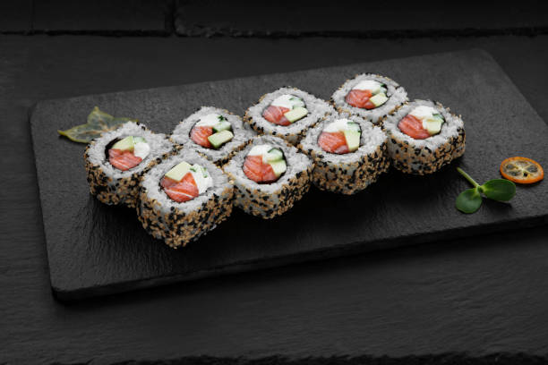 istock Sushi, rolls, fish dishes. Seafood delicacies 1181607524