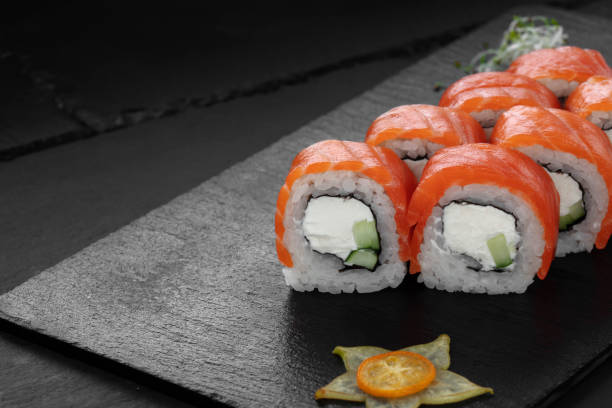 istock Sushi, rolls, fish dishes. Seafood delicacies 1181607569