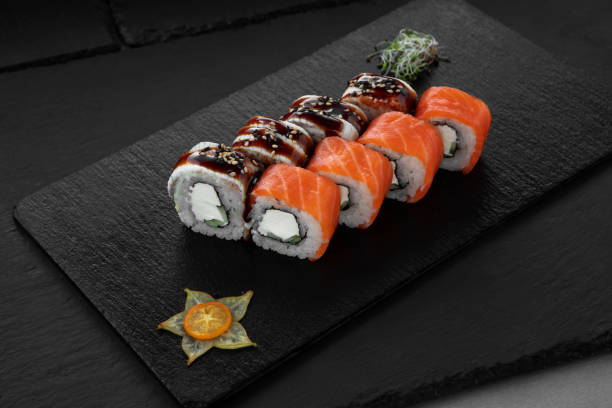istock Sushi, rolls, fish dishes. Seafood delicacies 1181607589