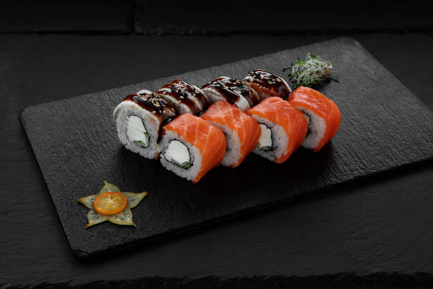 istock Sushi, rolls, fish dishes. Seafood delicacies 1181607592