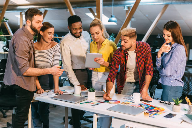 istock Colleagues working together with tablet and palette 1181607717