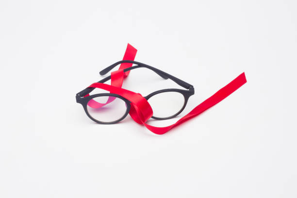 istock glasses and gift ribbon 1181607931