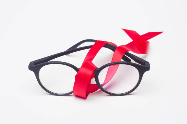 istock glasses and gift ribbon 1181607939