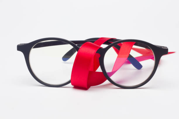 istock glasses and gift ribbon 1181607945