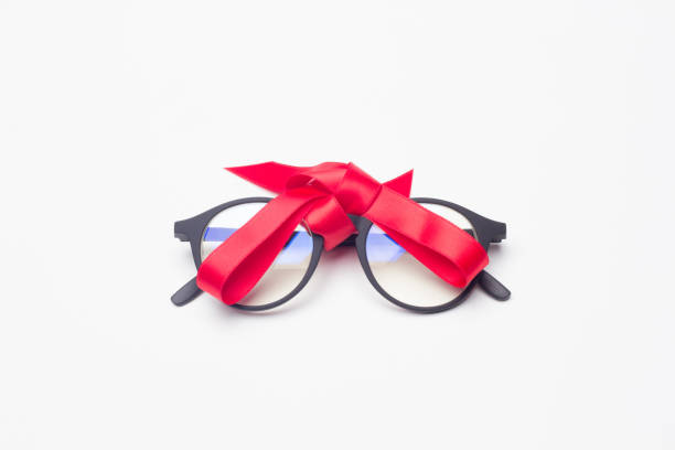 istock glasses and gift ribbon 1181607950