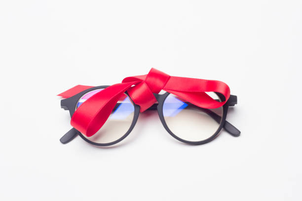 istock glasses and gift ribbon 1181607958