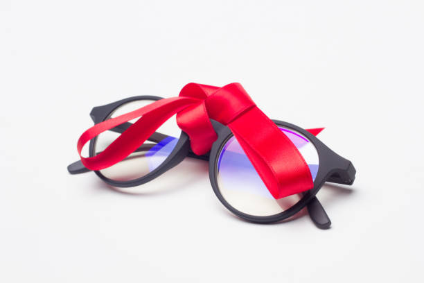 istock glasses and gift ribbon 1181607967