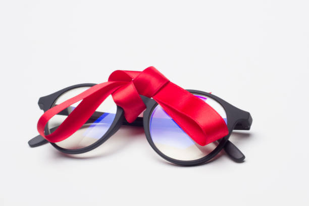 istock glasses and gift ribbon 1181607970