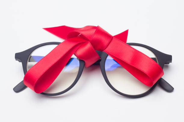 istock glasses and gift ribbon 1181607987