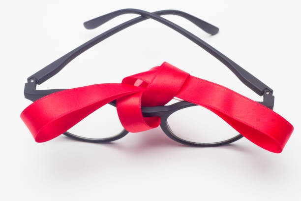 istock glasses and gift ribbon 1181607991