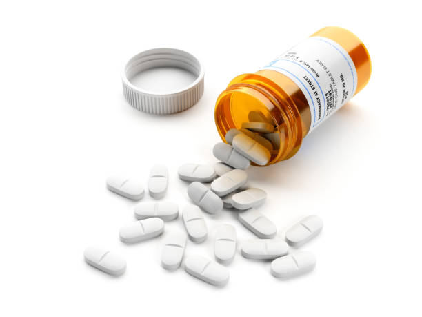 白い背景に白い錠剤 - pill medicine capsule excess ストックフォトと画像