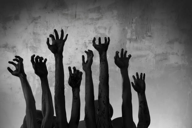 istock crowd of stretched zombie hands halloween theme, render 3D 1181609289