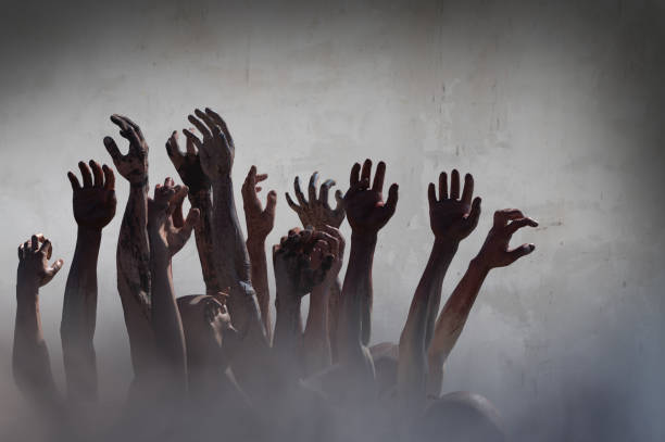 istock crowd of stretched zombie hands halloween theme, render 3D 1181610067