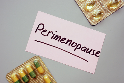 Text sign showing hand written words Perimenopause