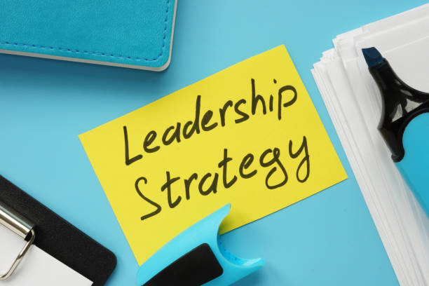 istock Text sign showing hand written words Leadership Strategy 1181611115