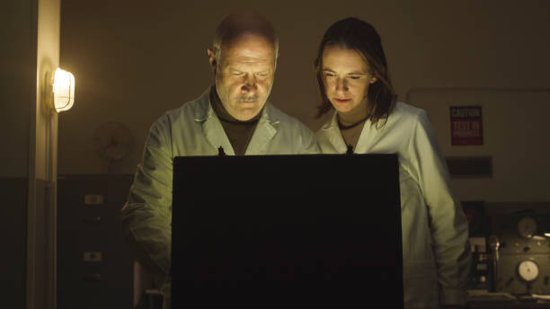 istock Scientists opening a briefcase in the lab 1181612387