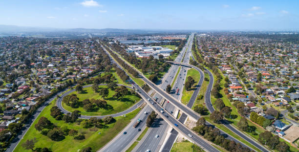 istock Typical road interchange in Melbourne suburbs - aerial panorama 1181612609