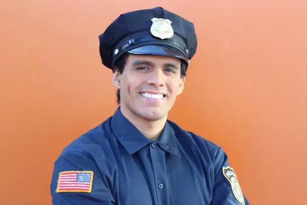 Ethnic American police officer with copy space.
