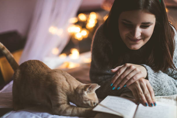istock Woman with cute cat 1181613134