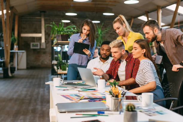 istock Startup concept. Young colleagues working on new project 1181618477