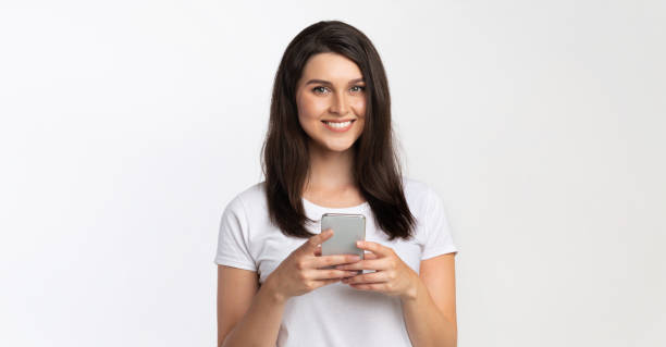 istock Happy Woman Using Smartphone Standing Over White Background, Panorama, Cropped 1181619188