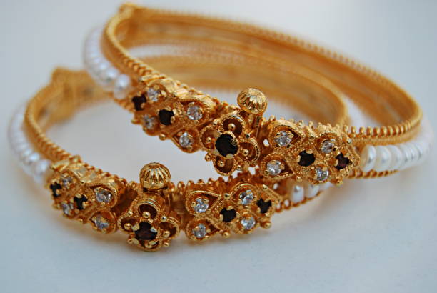 istock Close up of diamond studded pearl bangles. 1181619578