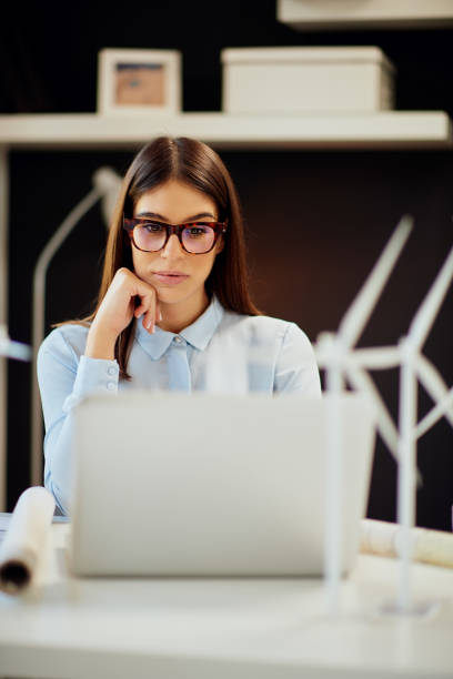 istock Businesswoman using laptop in office. 1181620860