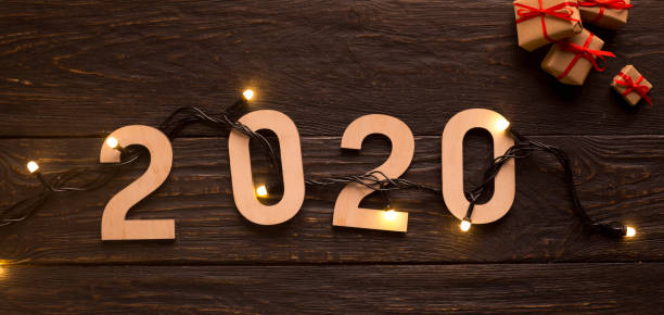 istock New beginnings with 2020 holiday concept, garland with lights 1181621244