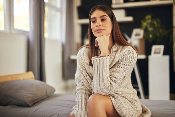istock Woman posing in bedroom. 1181621855