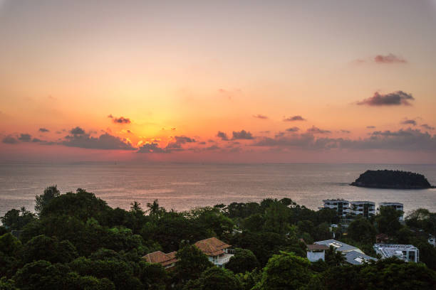 sunset scene and clouds over Kata Beach in Phuket, Thailand