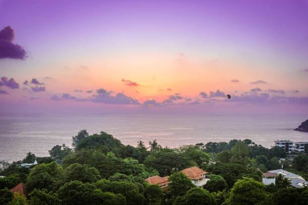 istock sunset scene and clouds over Kata Beach in Phuket, Thailand 1181624104