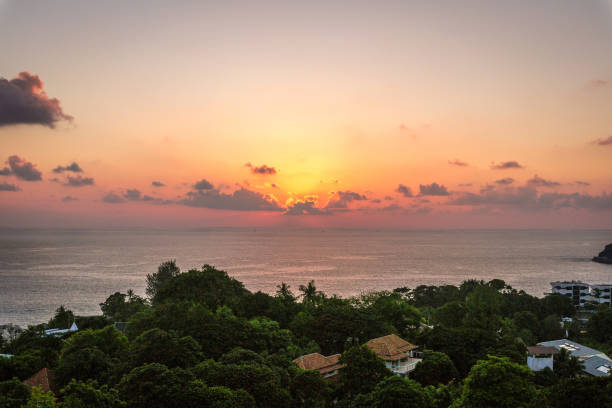 istock sunset scene and clouds over Kata Beach in Phuket, Thailand 1181624150